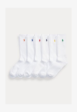 Six pairs of white crew socks laid side by side, each with a small embroidered polo player logo in different colors on the cuff.