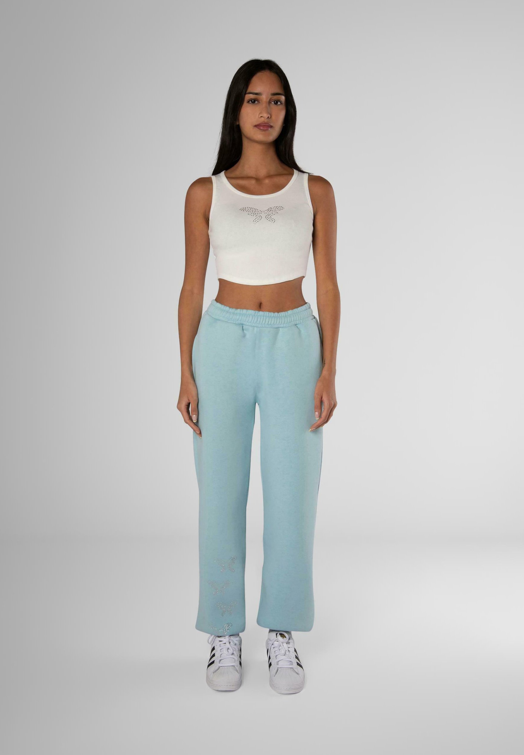 FELICIOUS REGULAR - Tracksuit bottoms - rhinestones pastel blue/blue -  Zalando.co.uk