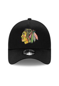 Black cap featuring a multicolored embroidered logo of a Native American profile with feathers. Material: fabric with a curved visor design.