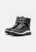 Adidas By Stella Mccartney Eulampis Winter Boots Core Black Utility Black Granit Black Zalando Co Uk