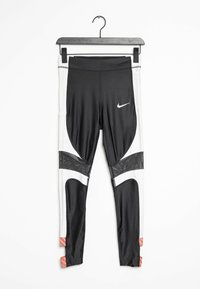 Mustat ja valkoiset urheiluleggingsit, joissa on verkko-paneelit, tiukka muotoilu ja vaaleanpunaiset yksityiskohdat alaosassa. Sisältää Nike-logon valkoisena.