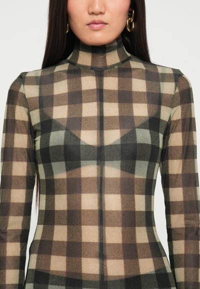 Long-sleeve, high-neck bodysuit in beige, brown, and green plaid pattern. Sheer fabric shows skin underneath; features fitted silhouette.