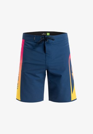 Bañador azul marino con un diseño degradado que presenta acentos en rosa y amarillo; incluye una cintura con cordón y tela duradera.