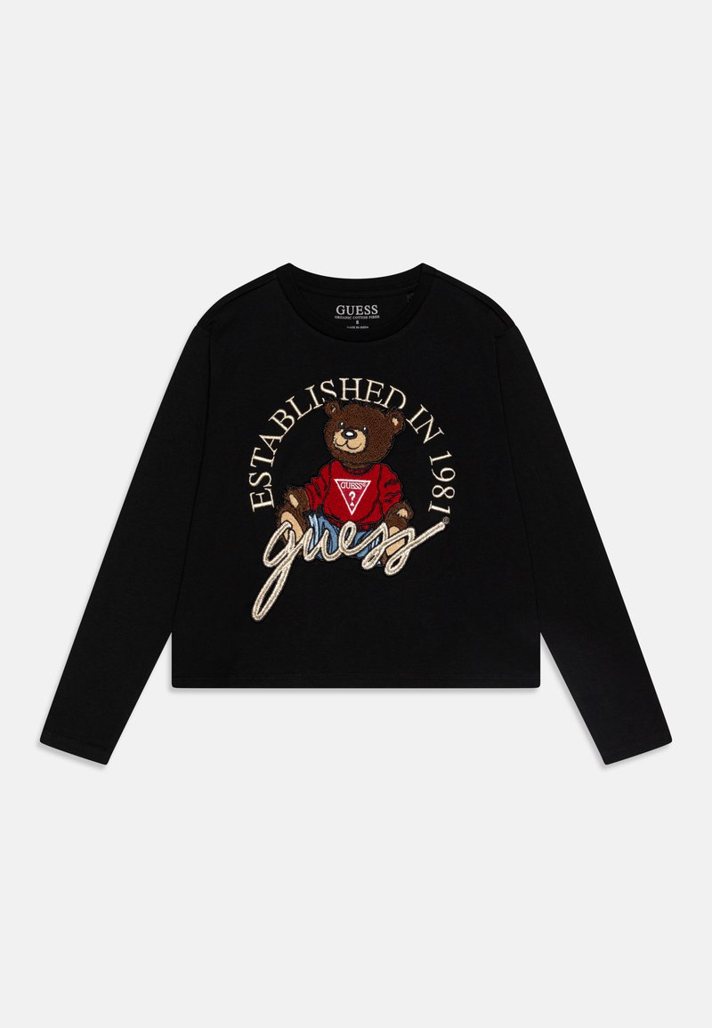 Fekete, hosszú ujjú póló, hímzett medve mintával, piros pulóverben, és feliratozva "Alapítva: 1981" és "guess."