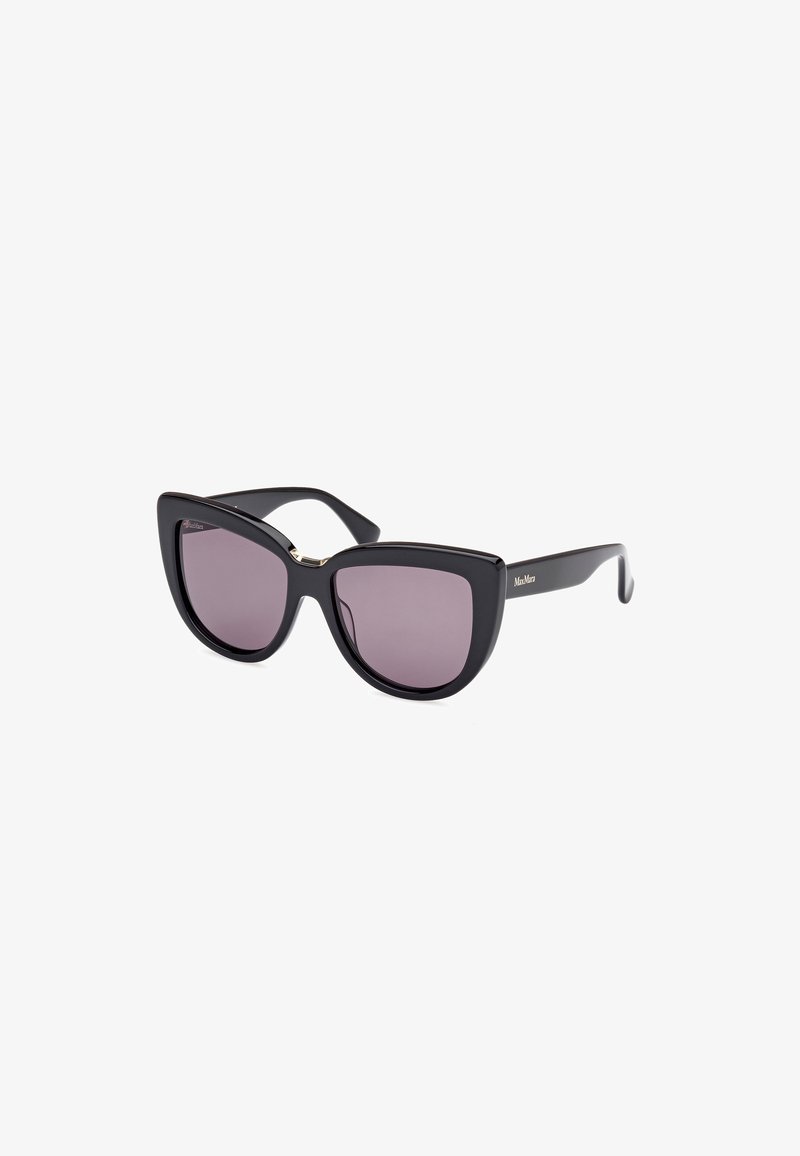 Zwarte cat-eye zonnebril met paarse lenzen, slank kunststof montuur, opvallende hoeken en een gouden accent bij de tempel voor extra detail.