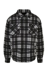 Chemise en flanelle à carreaux noirs et gris avec fermeture éclair à l'avant, deux poches poitrine, manches longues et coupe décontractée. Tissu doux avec une surface texturée.