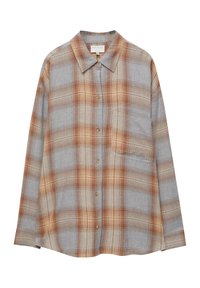 Chemise à manches longues avec boutons, motif à carreaux orange, beige et gris, et poche poitrine sur fond blanc.