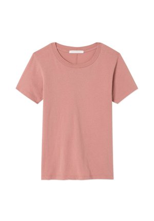 Svetlo ružové tričko s krátkym rukávom vyrobené z mäkkej bavlny. Má okrúhly výstrih a voľný strih. Bez viditeľných vzorov či ozdôb.
