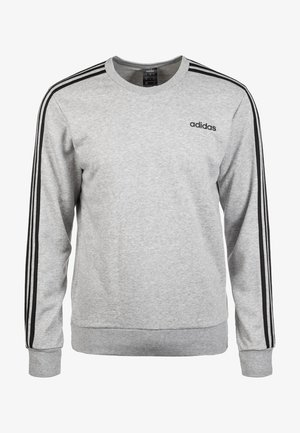 Sweat-shirt gris Adidas col rond avec trois bandes noires le long des manches et logo Adidas sur la poitrine gauche.