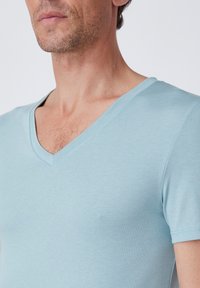 Damart COL V CLIMATYL - T-shirt basic - vert