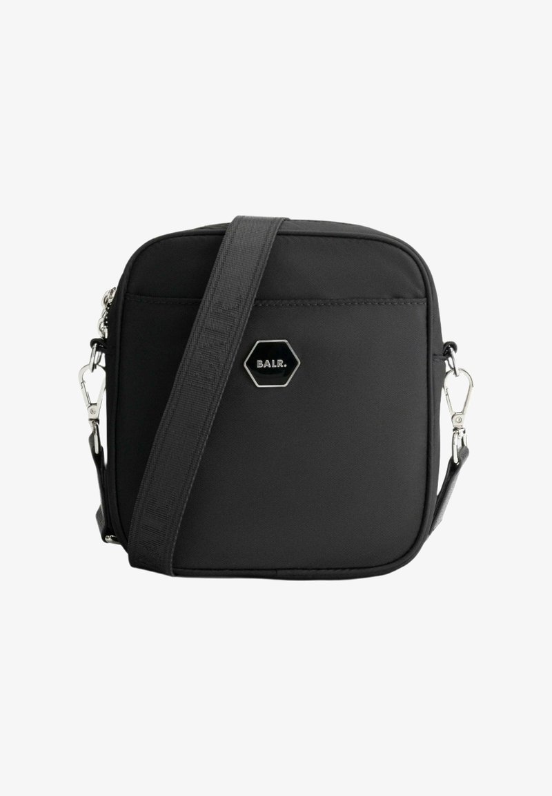 Black crossbody bag made of durable fabric, featuring a rectangular shape, adjustable strap, and a hexagonal emblem on the front.
