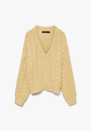 Smėlio spalvos stambios pynimo megztinis su V formos iškirpte ir ilgomis rankovėmis, su ribinėmis apykaklėmis ir apačia, atidėtas plokščiai.