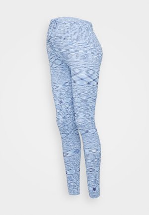 Leggings azuis com padrão, apresentando um design texturizado em diferentes tons de azul, forma ajustada e uma cintura elástica.
