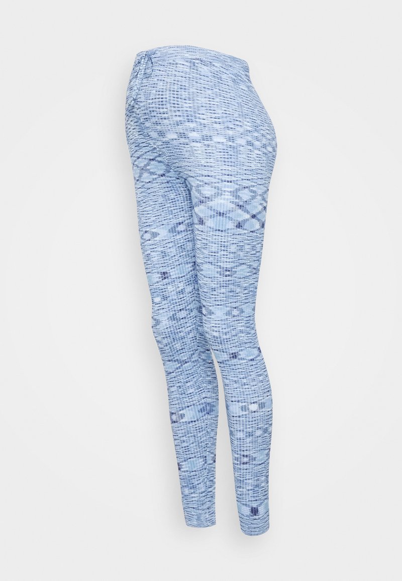Leggings azuis com padrão, apresentando um design texturizado em diferentes tons de azul, forma ajustada e uma cintura elástica.