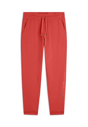 Pantaloni jogger rossi con vita regolabile, dotati di due tasche laterali e un sottile dettaglio testuale sulla parte bassa della gamba. Tessuto morbido e liscio.