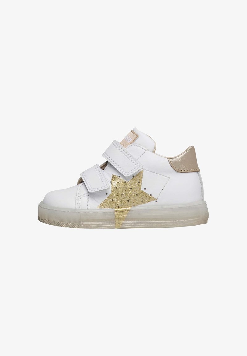 White children's sneaker with gold glitter star design, dual Velcro straps, and a clear rubber sole. Features a metallic gold heel accent.