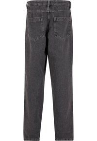 Donkergrijze denim jeans gezien vanaf de achterkant met twee achterzakken en een rechte pasvorm.