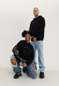 YOURTURN UNISEX - Hoodie - black