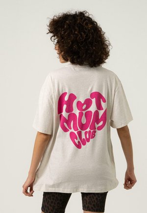 Light gray oversized t-shirt featuring a large, bold pink "HOT MUM CLUB" graphic on the back, with a soft, cotton texture.