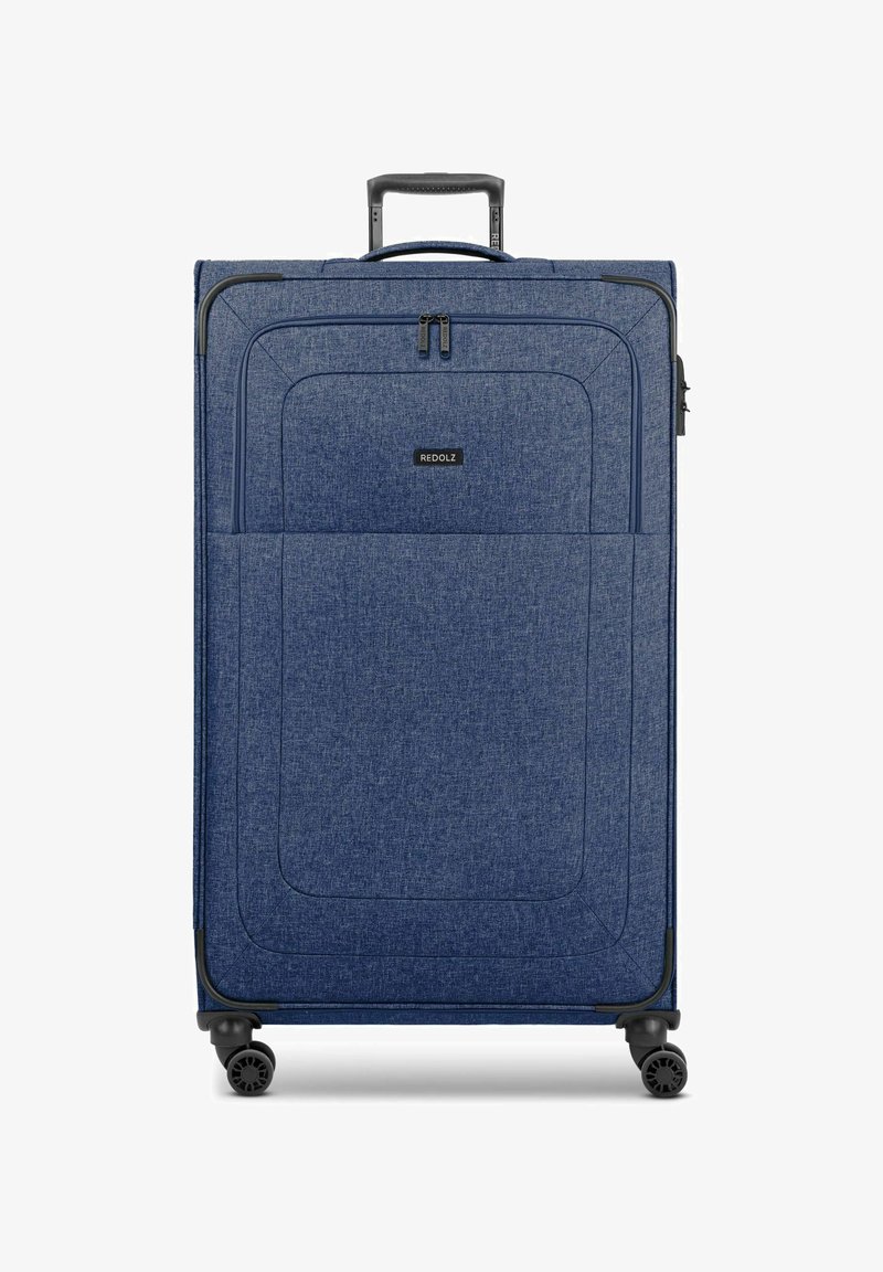 Valigia blu in tessuto con finitura testurizzata, manico retrattile e quattro ruote. Presenta una tasca frontale con zip e un logo sul fronte.