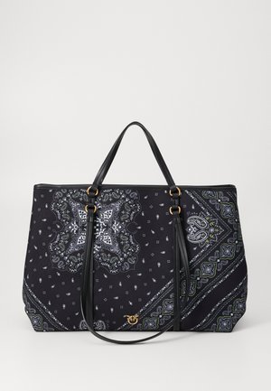 Geantă tote neagră cu un model paisley alb și verde, curele din piele neagră și un mic logo aurit în centrul frontal.