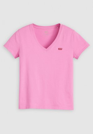 V-neck pink T-shirt made of cotton, featuring short sleeves and a small red Levi’s logo on the chest. Smooth texture, casual design.