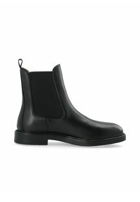 Stivale Chelsea in pelle nera con pannelli elastici laterali, punta tonda, texture liscia e linguetta sul tallone. Sola in gomma piatta resistente.