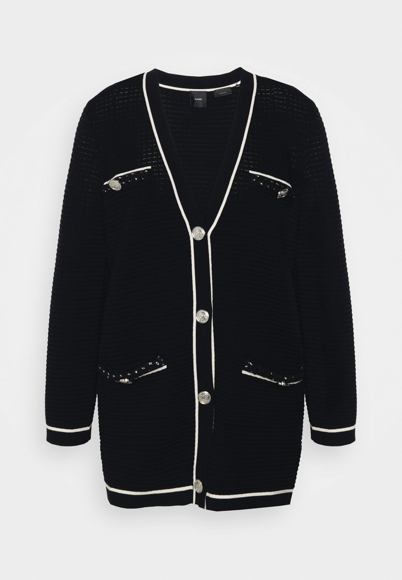 Cardigan noir à manches longues avec bordure blanche, boutons argentés et quatre poches avant avec détails métalliques aux boutons.