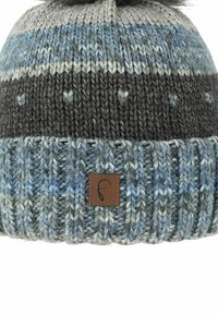 Knitted beanie in gray and blue with vertical stripes, featuring a pom-pom on top and a brown leather logo patch near the base.