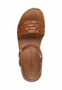 Brune lædersandal med vævede stropper, justerbar ankelspænde og korksål. Har en glat fodseng med prægede brandlogo.