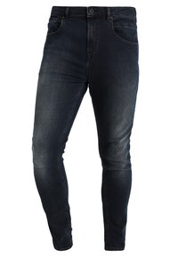 Dunkelblaue Denim-Jeans im Slim-Fit, mit Knopfverschluss, fünf Taschen und dezenten Ausbleichungen an den Oberschenkeln und Knien.