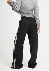 Next WIDE LEG - Kelnės - black  grey