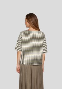 Striped short-sleeve top in olive green and white, relaxed fit with a round neckline and textured fabric. Features a straight hem.