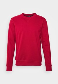 Sudadera roja de manga larga con cuello redondo, puños y dobladillo acanalados. Hecha de una tela suave, presenta un detalle de costura tonal y una etiqueta de logo en el lateral.
