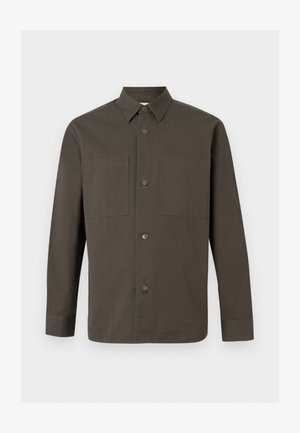 Dark olive green long-sleeve button-up shirt with a pointed collar and two chest pockets against a light gray background.