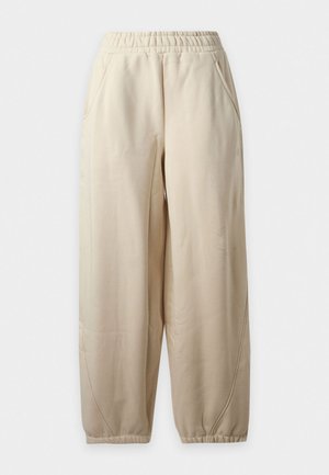 New Balance, ATHLETICS CRAFTED PANT - Долнище на анцуг - beige