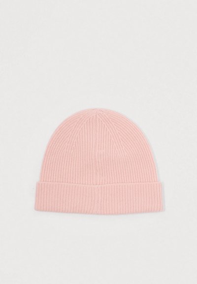 Roze gebreide beanie met een textuur ribbelontwerp, met een omgeslagen rand en een naadloze bovenkant, geschikt voor casual draag.