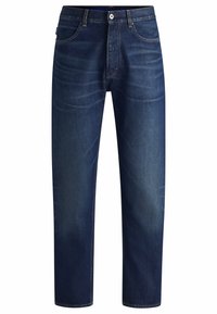 Jeans in denim blu scuro con design a gamba dritta, stile a cinque tasche e leggera scoloritura su tutta la superficie. Dettagli cuciti in filo di colore contrastante.