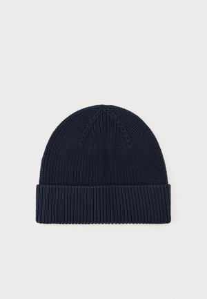 Navy blue knitted beanie hat with a ribbed texture, featuring a folded cuff and subtle seam detailing on the top.