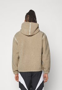 adidas Originals PREMIUM ESSENTIALS - Vinterjakke - beige