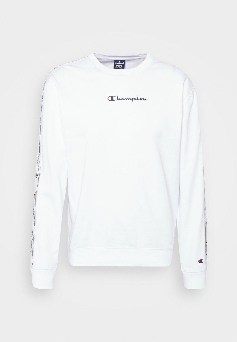 Witte sweatshirt met lange mouwen, ronde hals, zwart Champion-logo op de borst en patroonaccenten langs de mouwen. Zachte stof.