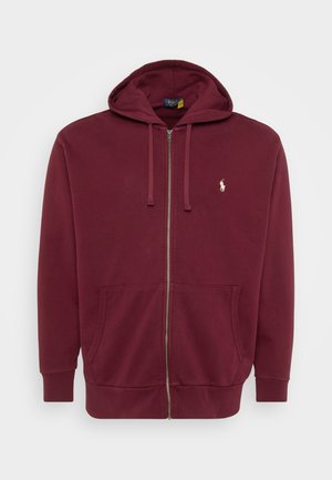 Bordo krūšturis ar rāvējslēdzēju un priekšējām kabatām, izvelkamām auklām kapucei un mazu baltu Polo Ralph Lauren logo uz krūtīm.