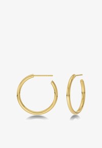 Seleccionado, gold-coloured