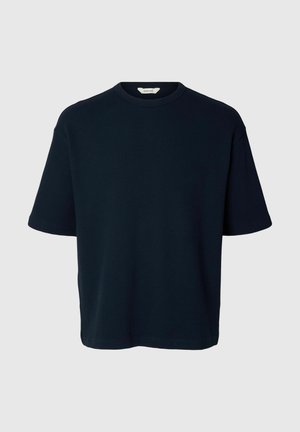 Mørkeblå kortermet crew neck t-skjorte i bomull med ribbestruktur og avslappet passform.