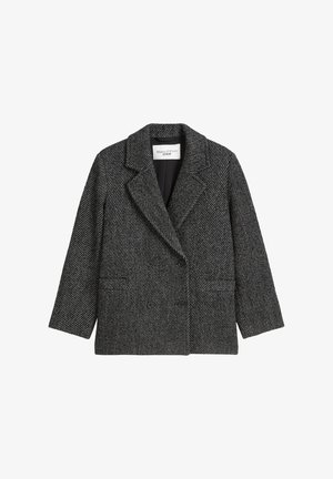 Blazer doppiopetto bianco e nero a spina di pesce con rever a scapezzatura, due tasche frontali e bottoni neri. Tessuto in misto lana strutturato.