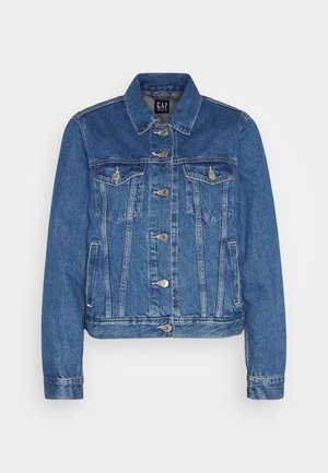 Denim jaka vidējā zilā krāsā ar īsotu dizainu, priekšu kabatām, metāla pogām un kontrastējošu šuvju. Klasisks apkakles un garās piedurknes.