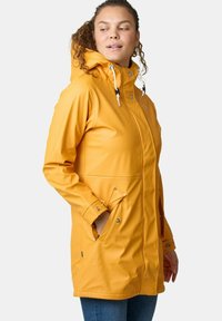 Yellow waterproof jacket with a hood, featuring snap-button pockets, drawstring accents, and a smooth, shiny texture.