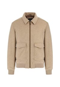 Beige wollen jack met rits, twee voorzakken met klep, geribde boorden en onderrand, en een kraag. Heeft een logo-label op de linkse pocket.