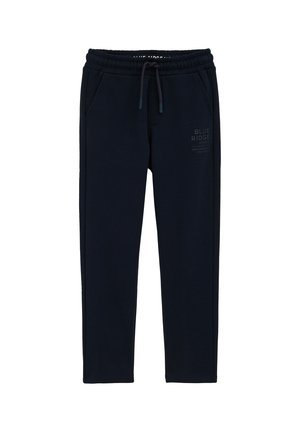 Pantaloni tuta blu navy con vita elastica e cordino, tasche frontali e piccolo testo stampato sulla coscia sinistra.