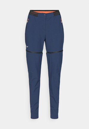 Pantaloni da esterno navy con un design aderente, realizzati in tessuto leggero. Presentano tasche con zip e dettagli neri ai ginocchi.